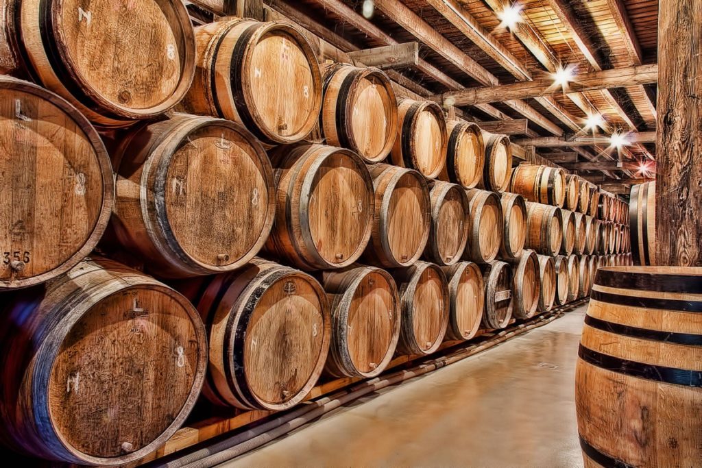 Oak barrels maturing beer in Belgium