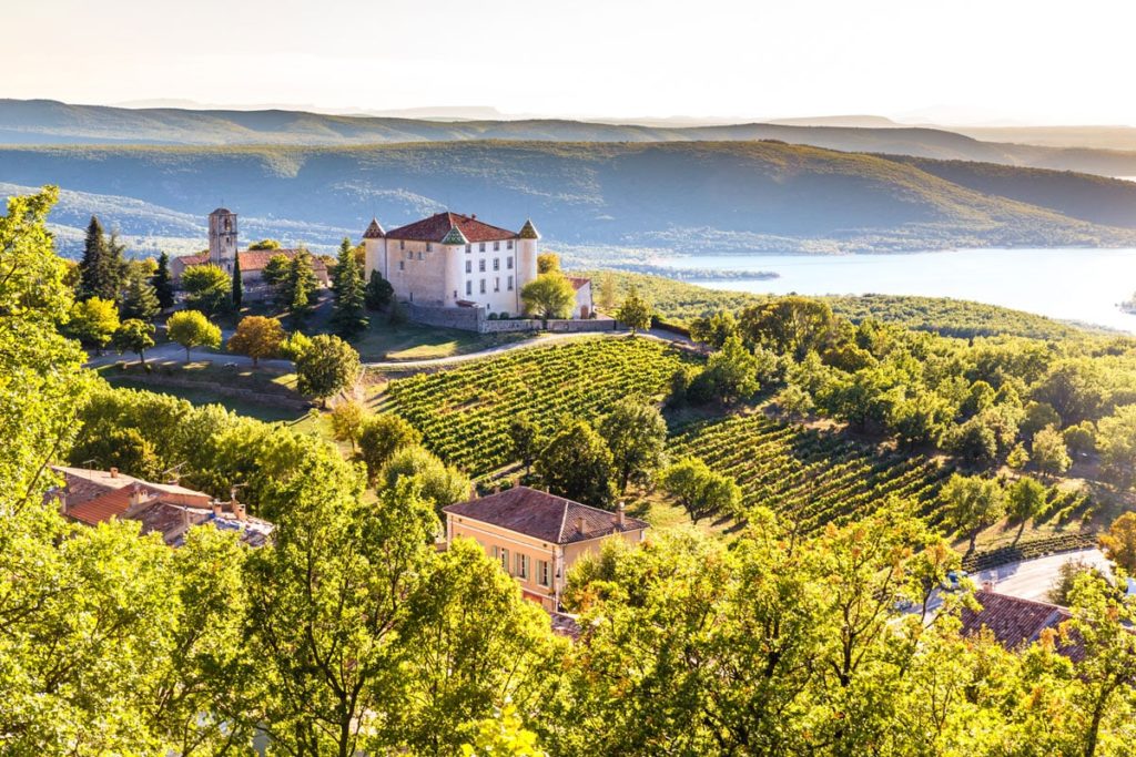Aiguines Village and Renaissance-style Chateau Overlooking Lac de Sainte Croix Lake-Alpes de Haute Provence in France