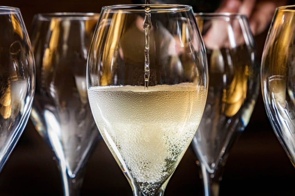 Prosecco being poured into a glass